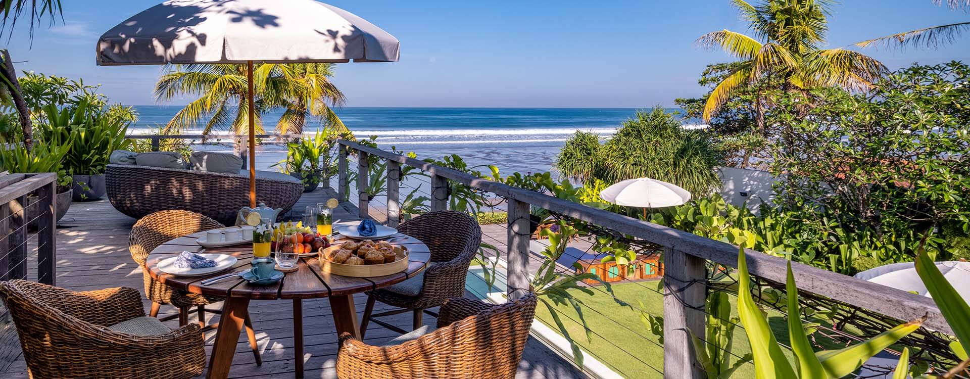 Noku Beach House - hearty breakfast with seaview